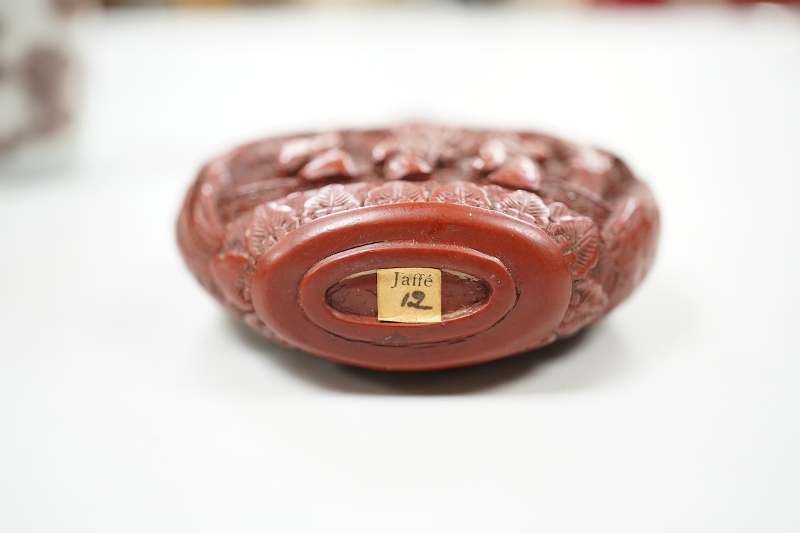 A Chinese cinnabar lacquer snuff bottle, a glass overlay snuff bottle and an underglaze copper red snuff bottle-9cm high (3)